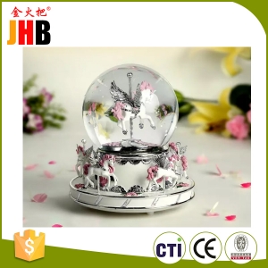 merry go round snow globe